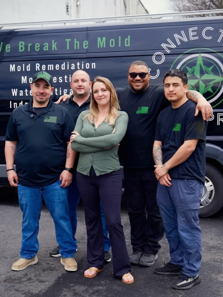 The CT Mold Pros team in front of their mold remediation van in Connecticut